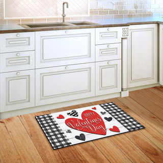 Briarwood Lane small checkered Valentine doormat with hearts and Happy Valentine's Day print on kitchen floor.
