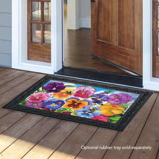 Briarwood Lane Pansies Spring Doormat with colorful floral design and black border on wooden porch.