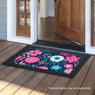Briarwood Lane Bright Floral Spring Doormat with pink, blue, and white flowers on wooden porch.