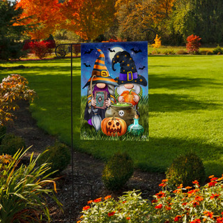 Briarwood Lane Halloween Gnomes Humor Garden Flag with colorful gnomes and pumpkin design outdoors.