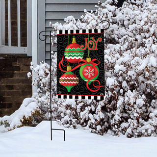 Briarwood Lane small printed Christmas garden flag with colorful ornaments on a decorative holiday display.