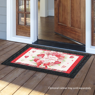 Briarwood Lane Valentine's Wreath Hearts doormat on a porch with pink hearts and red accents.