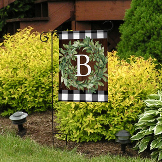 Briarwood Lane Wreath Monogram B Garden Flag with greenery on plaid background outdoor decor.