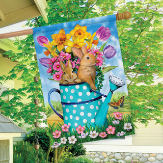 Briarwood Lane spring house flag with bunnies, tulips, daffodils, and colorful floral design on display.