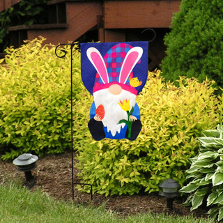 Briarwood Lane Easter Gnome Burlap Holiday Garden Flag with colorful spring design on display outdoors.