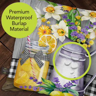 Briarwood Lane Lemonade Summer Decorative Pillow with colorful floral and fruit print on burlap material.