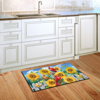 Briarwood Lane small printed doormat with colorful cardinals, sunflowers, and butterflies on kitchen floor.