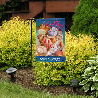 Briarwood Lane Seashell Welcome flag with colorful seashells on a small decorative garden flag display.