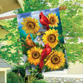 Briarwood Lane garden flag with colorful cardinals, sunflowers, and butterflies on a picket fence background.