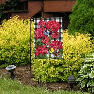 Briarwood Lane checkered garden flag with red flowers, butterflies, and colorful floral print on display.