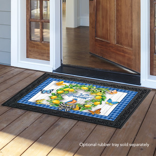 Briarwood Lane Lemon Wreath Spring Doormat with butterflies and plaid border on a wooden porch.