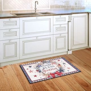 Briarwood Lane American Wreath Rustic Doormat with patriotic plaid and star design on kitchen floor.