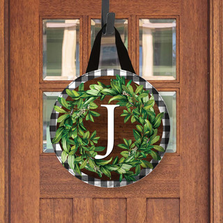 Briarwood Lane monogrammed letter J wreath with greenery on black and white checkered background.