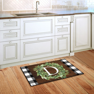 Briarwood Lane monogrammed doormat with black and white checkered border and letter D wreath design.