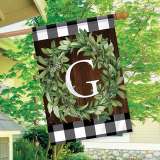 Briarwood Lane Wreath Monogram G double-sided house flag with greenery on plaid background decoration.