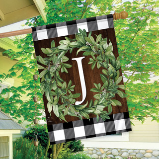 Briarwood Lane double-sided house flag with monogrammed greenery wreath on plaid background for porch display.