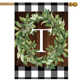 Briarwood Lane Wreath Monogram T house flag with greenery on checkered background for porch display.