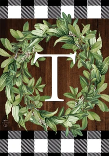 Briarwood Lane monogrammed wreath with greenery on checkered background, colorful decorative farmhouse porch display.
