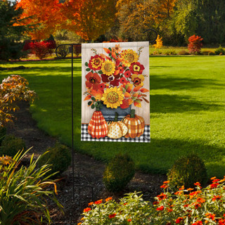 Briarwood Lane Autumn Bouquet Garden Flag with vibrant fall flowers and pumpkins on a black stand.