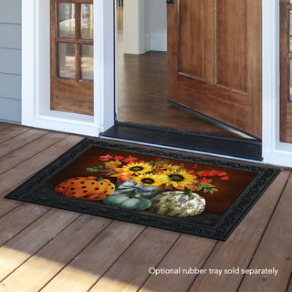 Briarwood Lane Patterned Pumpkins and Sunflowers doormat on a wooden porch outside an open door.