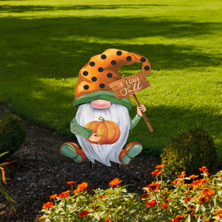 Briarwood Lane Fall Gnome Metal Yard Art with orange hat and pumpkin decoration outdoors.