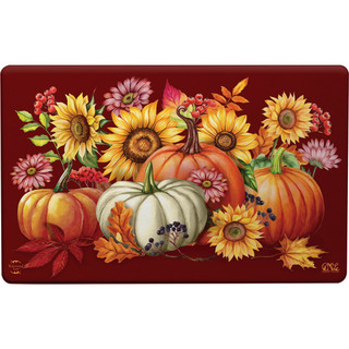 Briarwood Lane Fall Beauty Comfort Mat with vibrant pumpkins, sunflowers, and autumn leaves on red background.