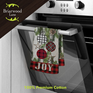 Briarwood Lane Patterned Ornaments cotton hand towel with JOY text on oven handle.