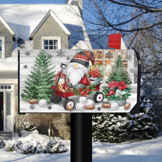 Briarwood Lane Wagon Gnome Mailbox Cover with gnome on red wagon amidst Christmas trees and decor.