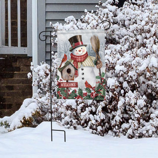 Briarwood Lane Jolly Snowman Welcome Garden Flag with snowman, birdhouse, and winter decor outdoors.