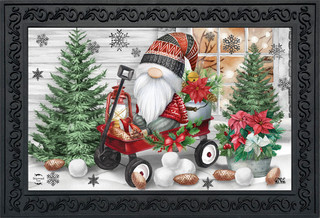 Briarwood Lane Wagon Gnome Doormat with gnome, trees, and holiday decor in a black frame.