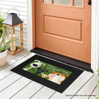 Briarwood Lane Spoiled Dogs Mini Mat with colorful dog design on black background at front door.