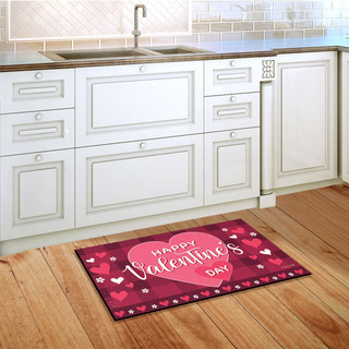 Briarwood Lane Happy Valentine's Day red doormat with hearts on wooden kitchen floor.