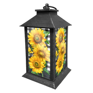 Briarwood Lane black metal lantern with checkered sunflowers design on glass panels, yellow and green hues.