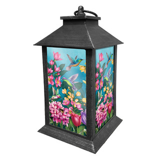 Briarwood Lane Springtime Hummingbirds Lantern with colorful floral design and hummingbirds on a white background.