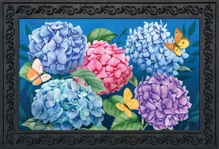 Briarwood Lane Colorful Hydrangeas doormat with blue, pink, purple hydrangeas and butterflies on black background.
