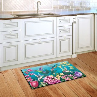 Briarwood Lane Springtime Hummingbirds doormat on wooden floor in front of white kitchen cabinets.