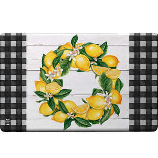 Briarwood Lane Lemon Wreath Comfort Mat, yellow lemons and green leaves on white wood background.