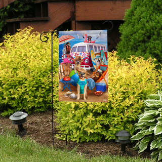 Briarwood Lane Dog Days Beach Garden Flag with colorful beach scene and dogs on display outdoors.