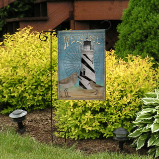Briarwood Lane Welcome Lighthouse Garden Flag with black and white lighthouse design on blue background.
