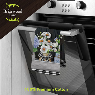Briarwood Lane Crated Mason Jars floral hand towel hanging on oven handle, black and white stripes.