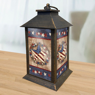 Briarwood Lane Americana Barnstar Lantern with patriotic stars and American flag design on wooden base.