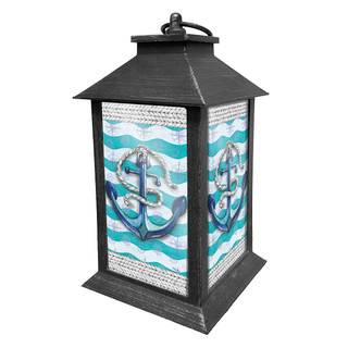 Briarwood Lane Welcome Anchor Lantern with nautical anchor design on turquoise and white wavy background.