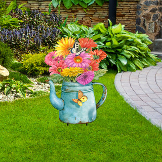 Briarwood Lane Gerber Daisy Watering Can Metal Art with colorful flowers and butterflies outdoor decor.