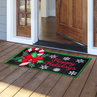 Briarwood Lane Festive Candy Canes Coir Doormat with green border and holiday design on wooden porch.
