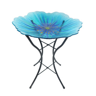 Briarwood Lane Blue Pansy Glass Birdbath with black metal stand and vibrant blue floral design.