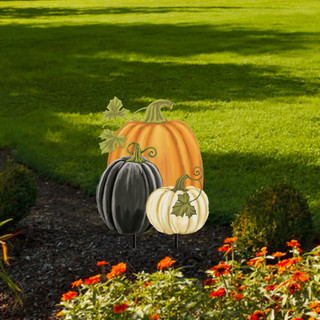 Briarwood Lane checkered pumpkins metal art garden decoration with orange, white, and black pumpkins.