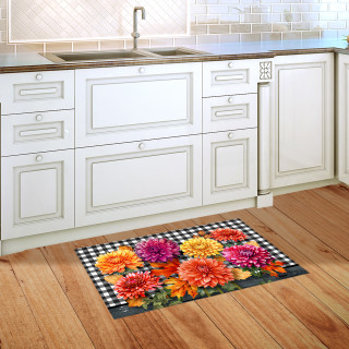 Checkered Mums Doormat with colorful flowers on black and white background on a wooden floor.