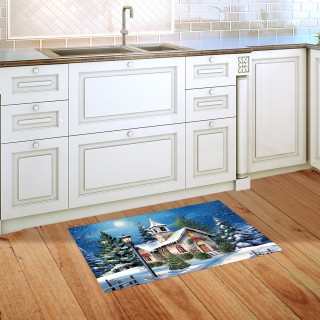 Holy Night Doormat on wooden floor in front of white kitchen cabinets with winter scene design.