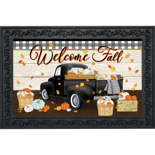 Black Welcome Fall truck doormat with orange and yellow fall leaves and pumpkins illustration.