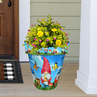 Gnome Sweet Gnome Large Planter with colorful garden gnome and butterfly design, filled with green flowers.